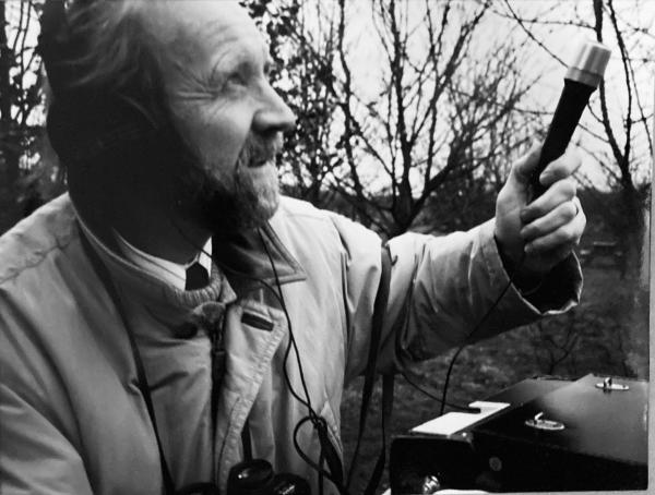 David Hindley with microphone mono scaled